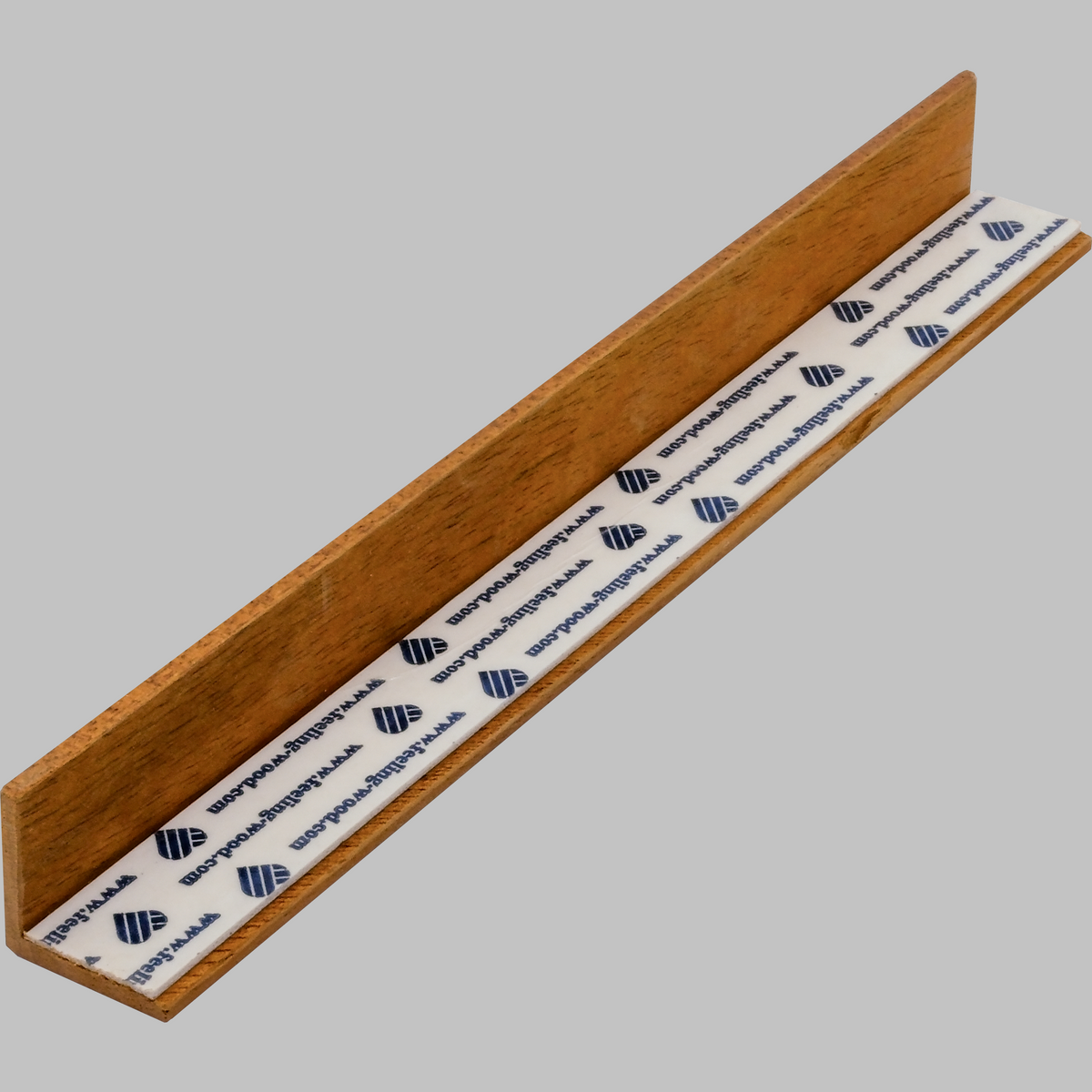 Cedar wood corner trim, back with peel and stick adhesive