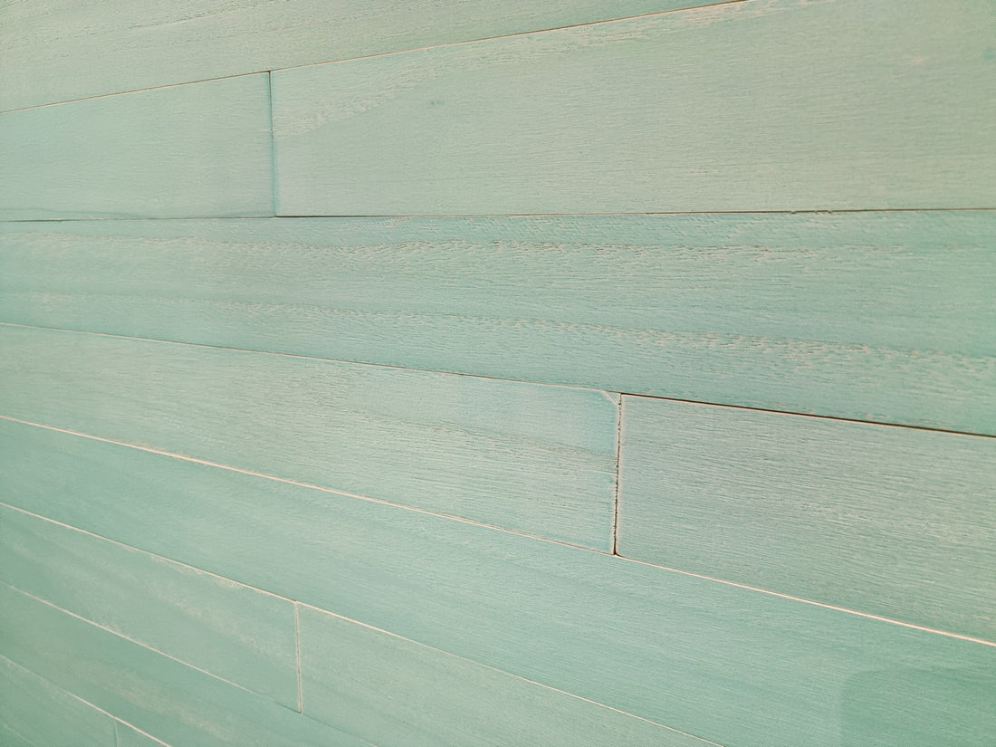 Aqua color-washed paulownia wood wall planks, front view